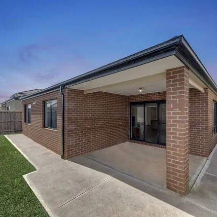 Rent this 4 bed apartment on Playfield Drive in Truganina VIC 3029, Australia