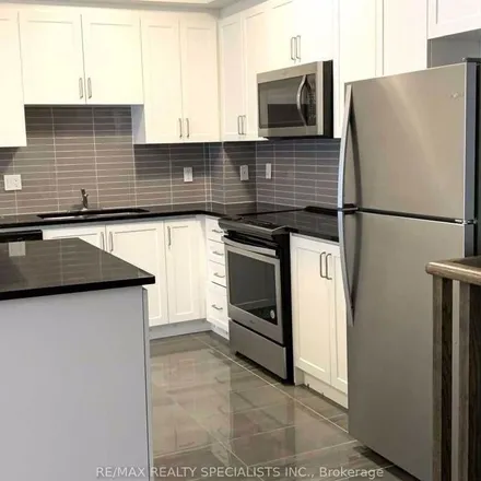 Rent this 2 bed townhouse on 27 Applewood Lane in Toronto, ON M9C 5S3