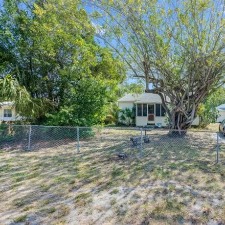Buy this 3 bed house on 1607 Avocado Avenue in Melbourne, FL 32935