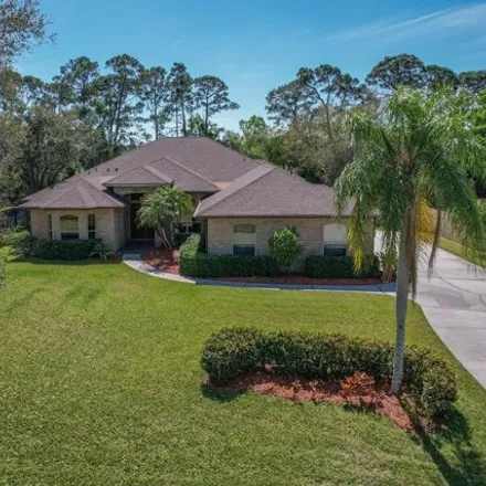 Buy this 5 bed house on 3874 Peacock Drive in Brevard County, FL 32904