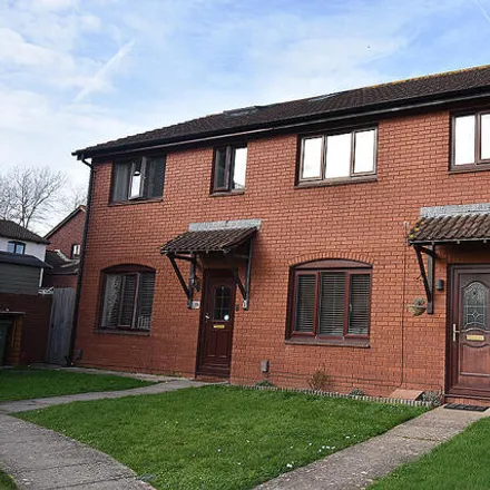 Buy this 3 bed townhouse on 65 Pinwood Meadow Drive in Exeter, EX4 9JP