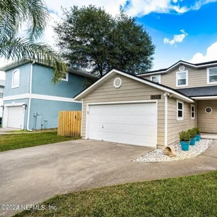 Rent this 3 bed house on 3977 Poincianna Boulevard in Jacksonville Beach, FL 32250