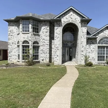Rent this 3 bed house on 1547 Palisades Drive in Carrollton, TX 75007