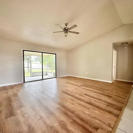 Rent this 3 bed apartment on 896 Mentmore Circle in Deltona, FL 32738