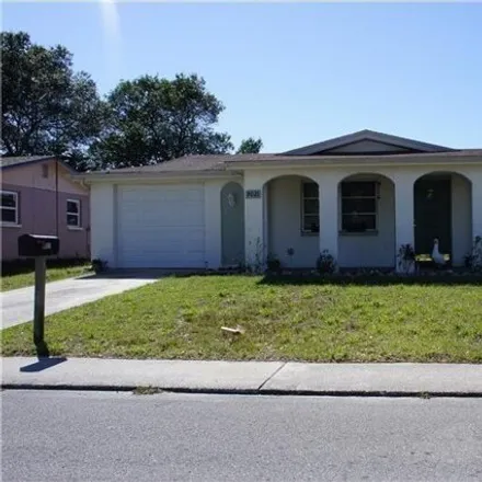 Rent this 2 bed house on 9053 Lunar Lane in Jasmine Estates, FL 34668