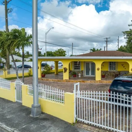 Buy this 4 bed house on 901 East 32nd Street in Hialeah, FL 33013