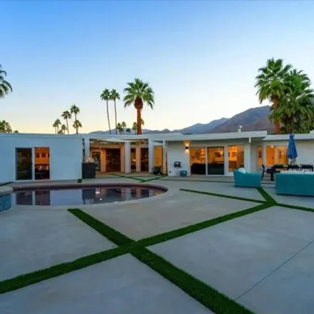 Rent this 4 bed house on Canyon Country Club North Golf Course in Via Ensenada Circle, Palm Springs