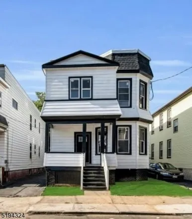 Rent this 4 bed house on 245 Dewey Street in Newark, NJ 07112