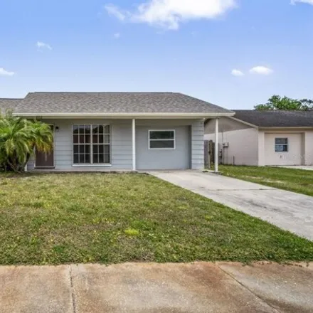 Buy this 4 bed house on 3554 Martell Street in Pasco County, FL 34655