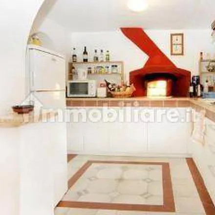 Rent this 4 bed apartment on Via Giacomo Orefice in 00124 Rome RM, Italy
