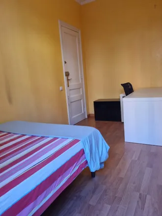 Rent this 4 bed room on Casa Lamadrid in Carrer de Girona, 08001 Barcelona