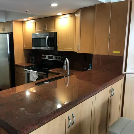 Rent this 3 bed condo on 7-Eleven in 1 West Flagler Street, Miami