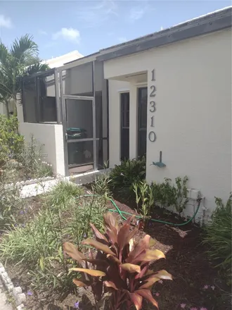 Buy this 2 bed townhouse on 12310 Southwest 147th Terrace in Miami-Dade County, FL 33186