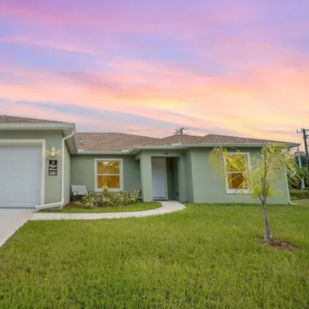 Buy this 4 bed house on 359 Ixora Avenue Northwest in Palm Bay, FL 32907