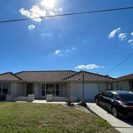 Rent this 3 bed house on 127 Leland Street Southwest in Port Charlotte, FL 33952