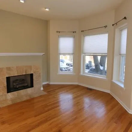 Rent this 4 bed apartment on 1015-1017 West Dakin Street in Chicago, IL 60613