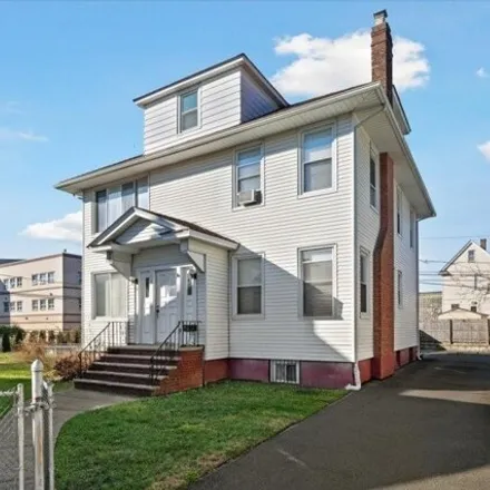 Buy this 4 bed house on 90 Kent Court in Passaic, NJ 07055