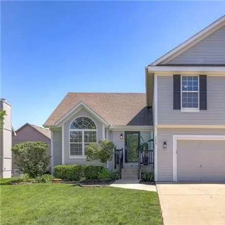 Buy this 4 bed house on 2331 Southwest Tracker Lane in Lee's Summit, MO 64082