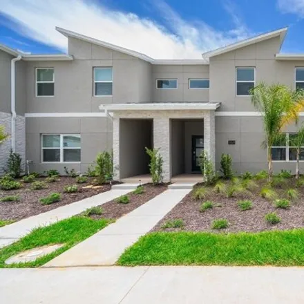 Buy this 4 bed townhouse on Challenge Drive in Osceola County, FL 33897
