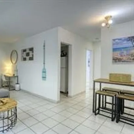 Rent this 2 bed apartment on 817 Northeast 18th Avenue