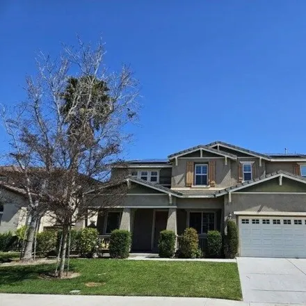 Rent this 4 bed house on 6664 Wood Canyon Court in Eastvale, CA 92880