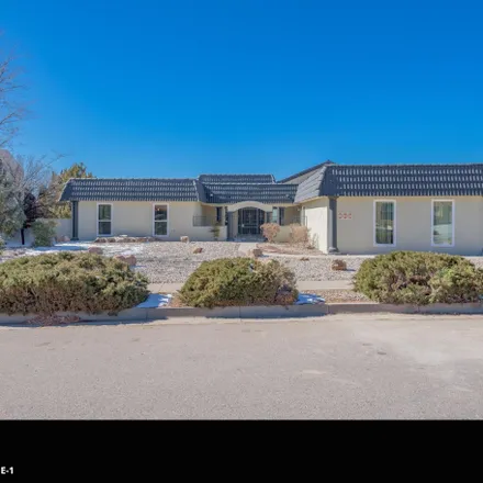 Rent this 4 bed house on 4915 Camino de Monte Northeast in Glenwood Hills, Albuquerque