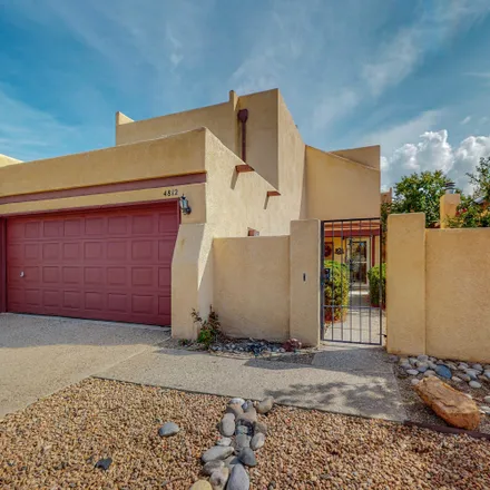 Buy this 3 bed townhouse on 4812 Manitoba Court Northeast in Albuquerque, NM 87111