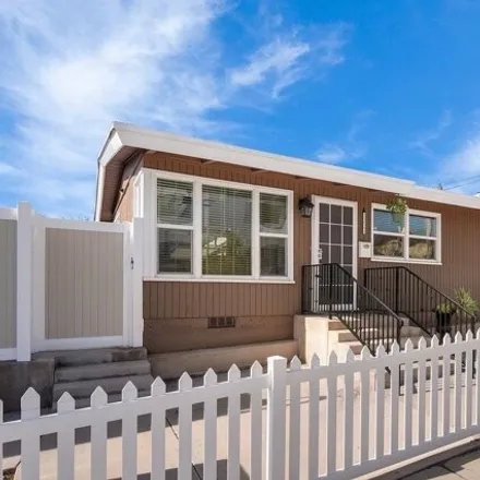 Rent this 4 bed house on 5220 Cass Street in San Diego, CA 92109