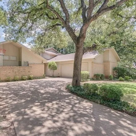 Rent this 4 bed house on 598 Country Wood Court in Arlington, TX 76011