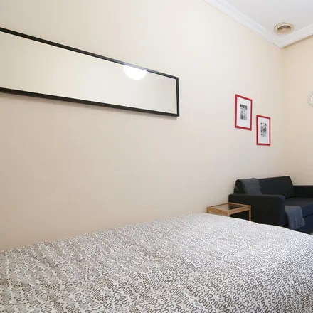 Rent this 8 bed room on Montmarte in Carrer de Sant Martí, 46001 Valencia