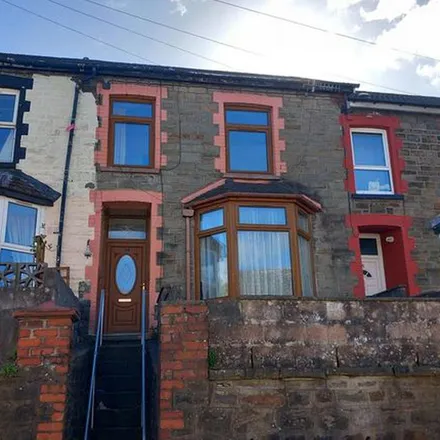 Rent this 2 bed townhouse on Ty'r Felin Street in Miskin, CF45 3YP