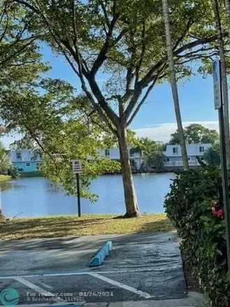 Rent this 2 bed condo on Azul at Kimberly Lakes in 4051 Northeast 13th Avenue, Oakland Park