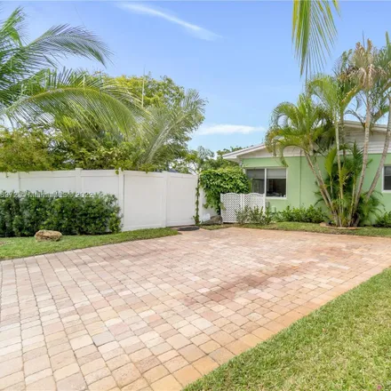 Buy this 4 bed house on 4301 Northeast 13th Avenue in Pompano Beach Highlands, Pompano Beach