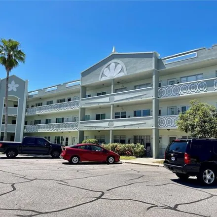Rent this 2 bed condo on 2257 World Parkway Blvd W Apt 69 in Clearwater, Florida