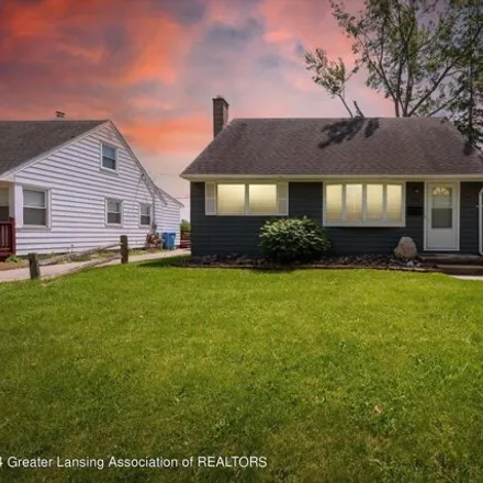 Buy this 3 bed house on 848 East Greenlawn Avenue in Lansing, MI 48910