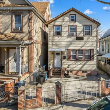 Buy this 4 bed house on 66-05 Laurel Hill Boulevard in New York, NY 11377