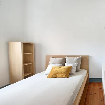 Rent this 4 bed room on Rua dos Heróis de Quionga 51 in 1170-179 Lisbon, Portugal