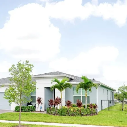 Buy this 3 bed house on Southwest Lyra Drive in Port Saint Lucie, FL