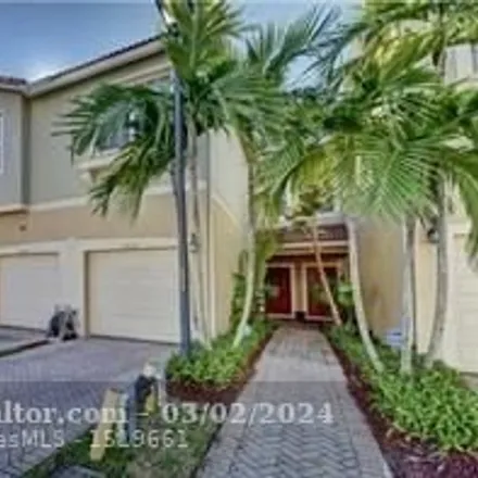 Rent this 3 bed townhouse on 9000 Plymouth Place in Tamarac, FL 33321