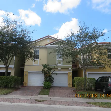 Rent this 3 bed townhouse on 1099 Pipers Cay in Palm Beach County, FL 33415