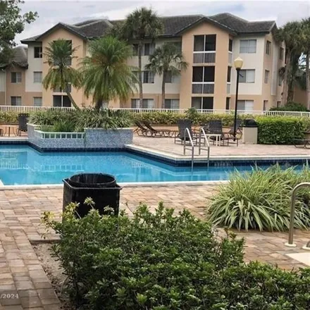 Buy this 2 bed condo on unnamed road in Westview Village, Coral Springs