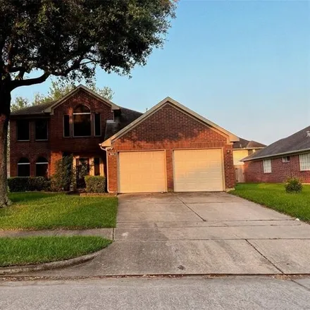 Rent this 4 bed house on 1892 Oak Hollow Drive West in Pearland, TX 77581