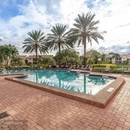 Buy this 2 bed condo on South Lyons Road in Pompano Beach, FL 33309