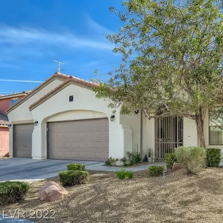 Buy this 4 bed house on 1801 Gentle Dawn Avenue in North Las Vegas, NV 89084