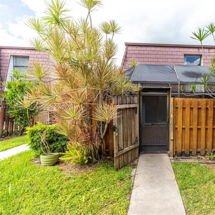 Rent this 2 bed townhouse on 7597 Courtyard Run West in Palm Beach County, FL 33433