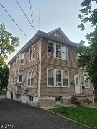Buy this 6 bed townhouse on 323 Tennyson Place in Passaic, NJ 07055