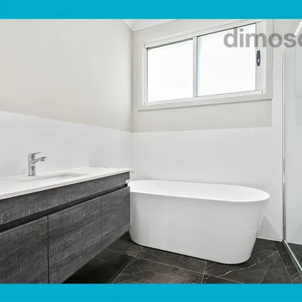 Rent this 3 bed apartment on Farmborough Road Public School in 56 Farmborough Road, Unanderra NSW 2526