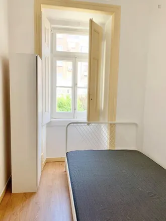 Rent this 8 bed room on Rua Palmira 40 in 1170-210 Lisbon, Portugal