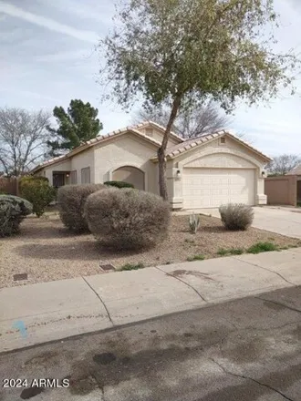 Rent this 3 bed house on 11438 West Virginia Avenue in Avondale, AZ 85392