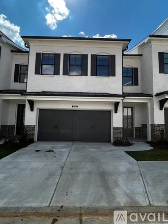 Rent this 3 bed townhouse on 5020 Buice Crest CT